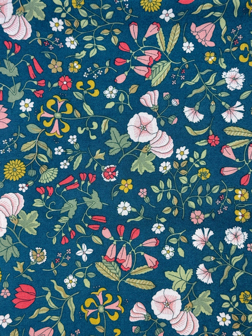 Floral pattern with colorful flowers on a blue background